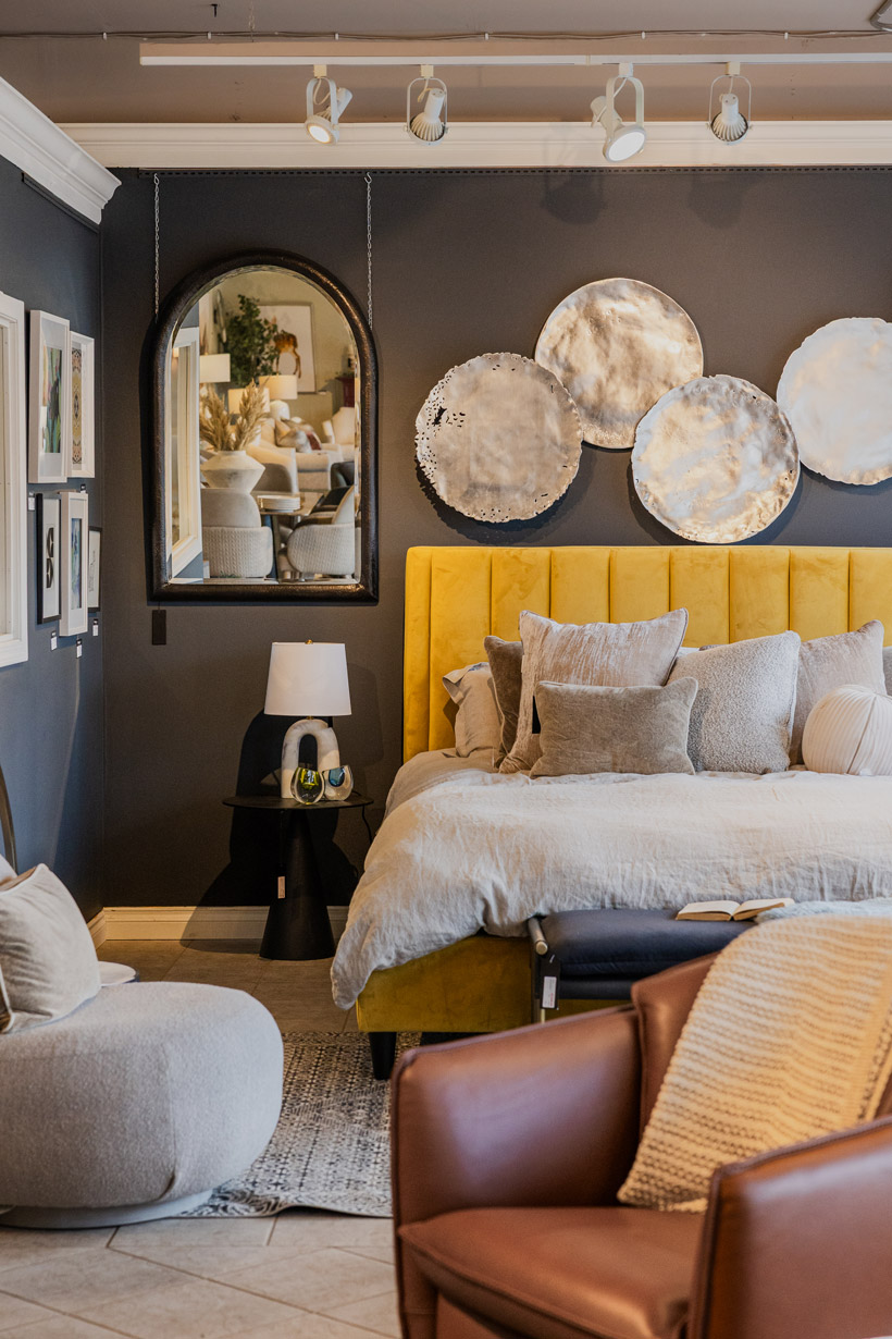 Styled bedroom vignette in the Marshall’s Home Living showroom